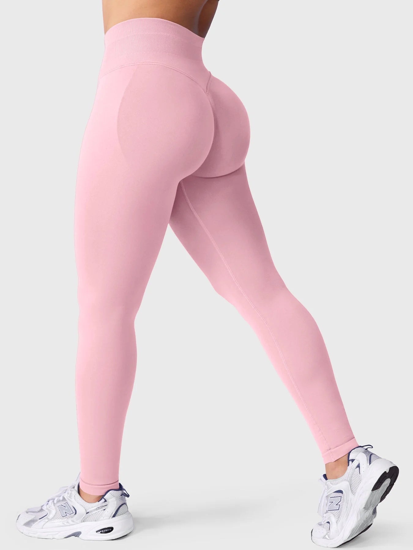 Leggings deportivos push up premium rosa, vista trasera, cintura alta y fruncido oculto que realza glúteos