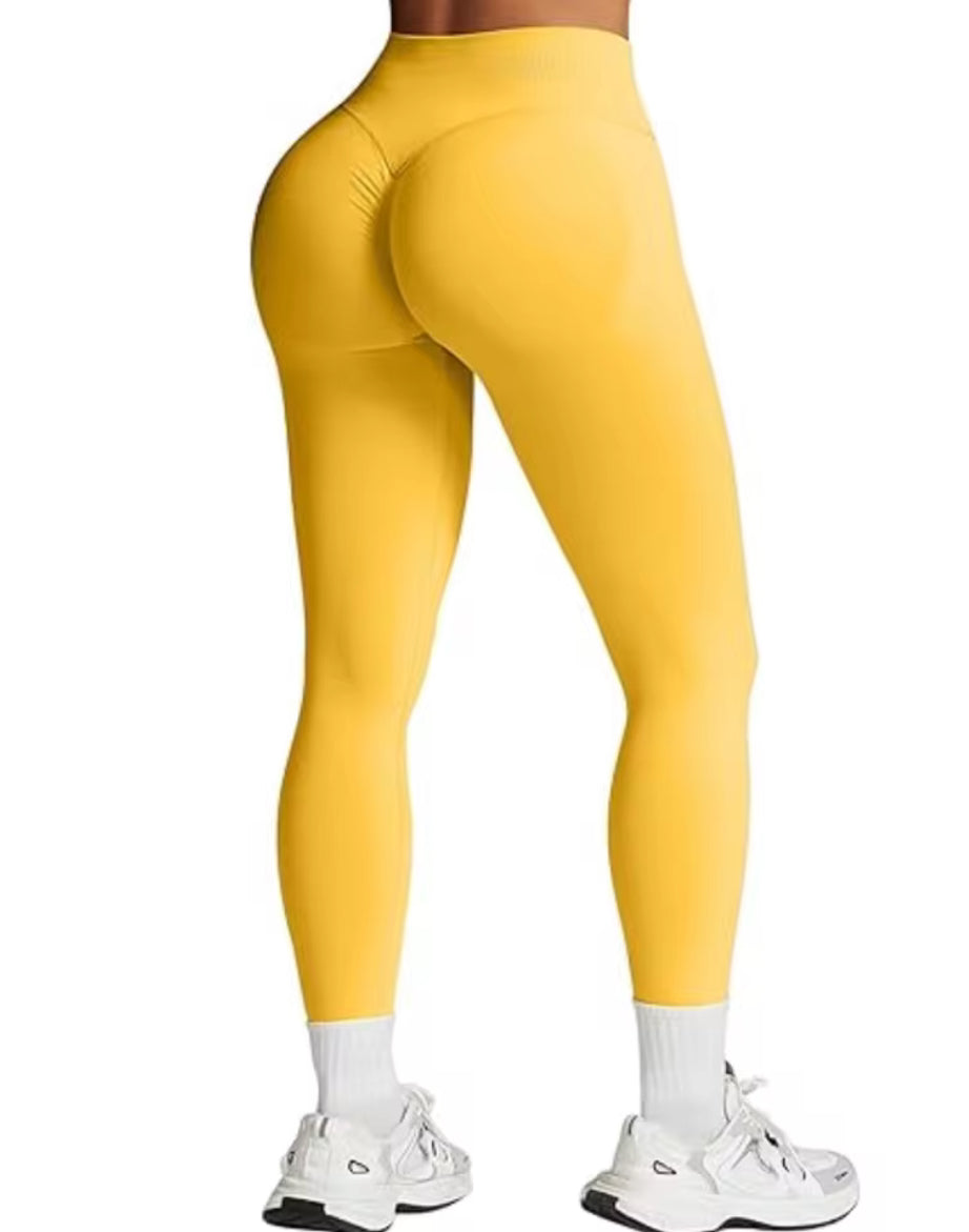 Leggings deportivos push up premium amarillo, cintura alta y fruncido oculto que realza glúteos
