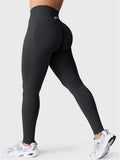 Leggings deportivos push up premium negros, vista trasera, cintura alta y fruncido oculto que realza glúteos